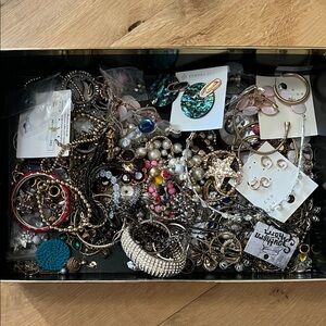 Box of costume Jewelry pieces some broken different brands